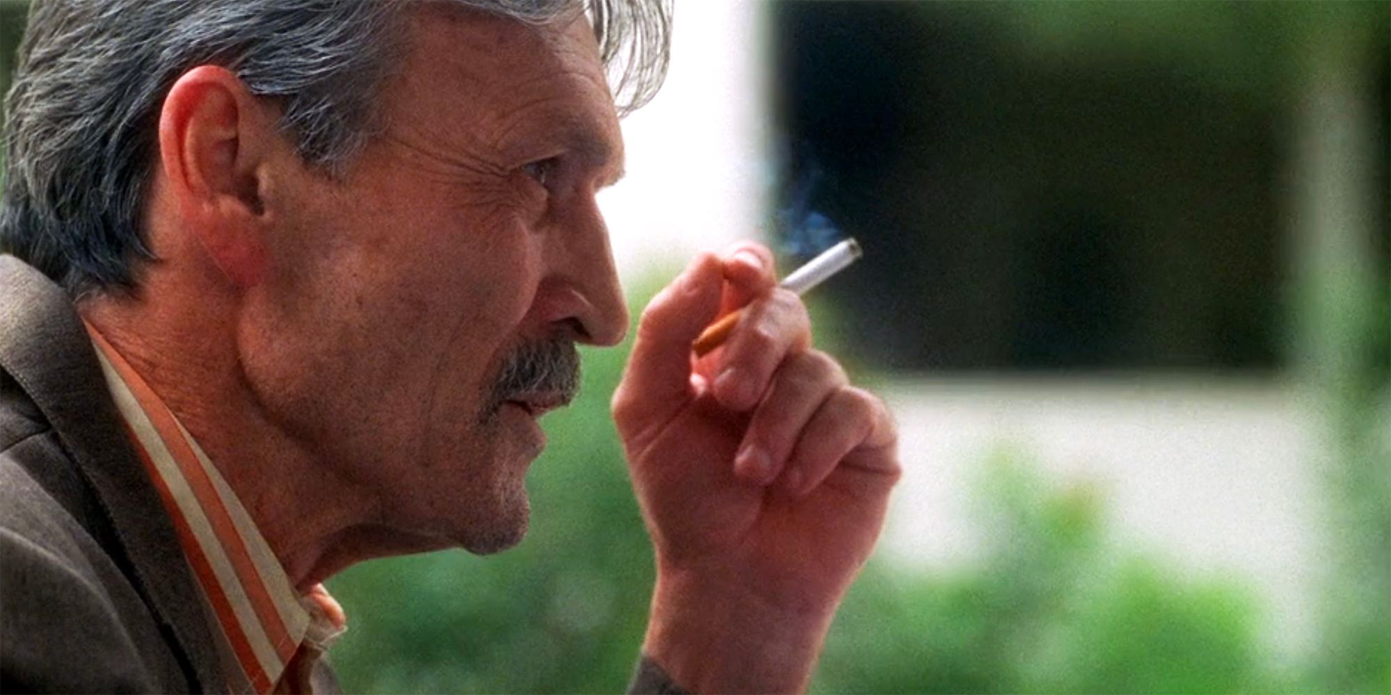 Muse Watson as Mike Franks smoking in NCIS Hiatus