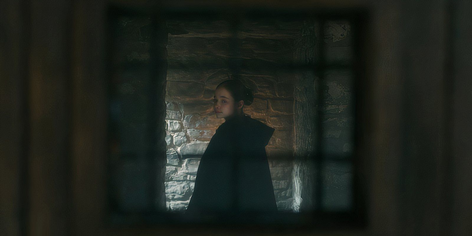 Margaret through the prison door in My Lady Jane