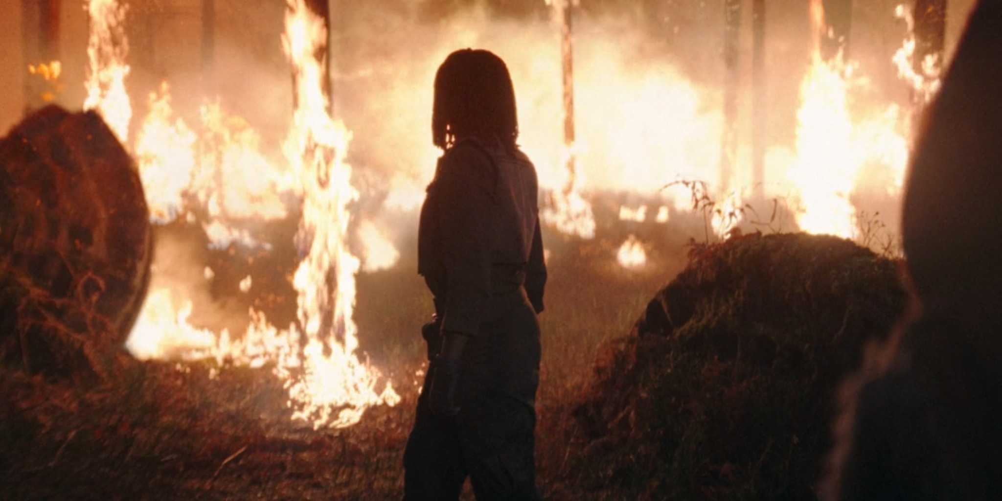 Osha Watching Brendok Burn in a flashback in The Acolyte