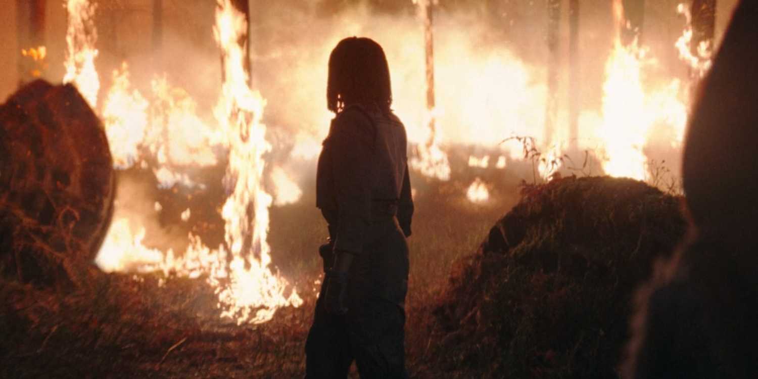 Osha Watching Brendok Burn in a flashback in The Acolyte