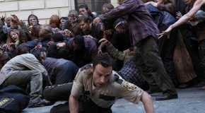 Andrew Lincoln as Rick Grimes escaping zombies in The Walking Dead, Days Gone Bye