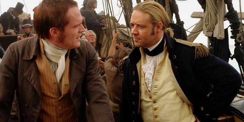 Paul Bettany e Russell Crowe em cena de Mestre dos Mares