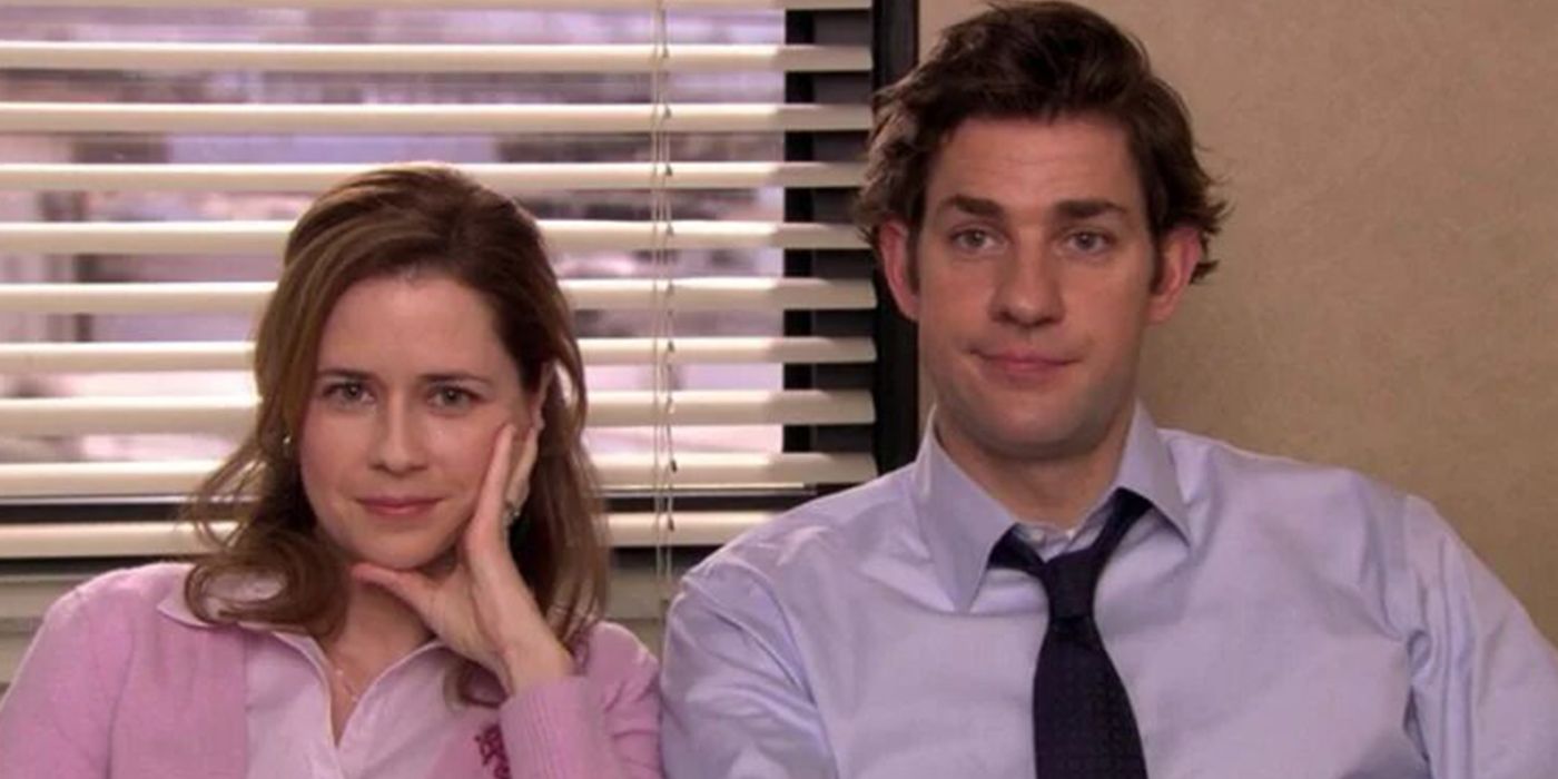 Pam and Jim staring at the camera and smirking in The Office