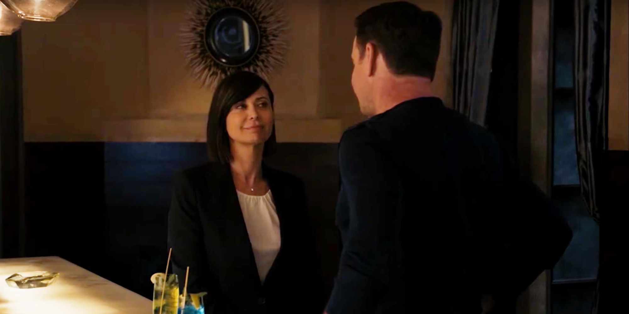 David Elliott as Harmon 'Harm' Rabb, Jr. and Catherine Bell as Sarah MacKenzie on NCIS: Los Angeles