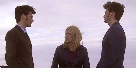 The Tenth Doctor, Metacrisis Doctor, and Rose Tyler standing together on Bad Wolf Bay in the Doctor Who episode 