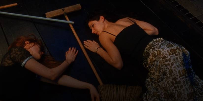 Gillian Owens & Sally Owens Lying On Ground In Practical Magic.jpg