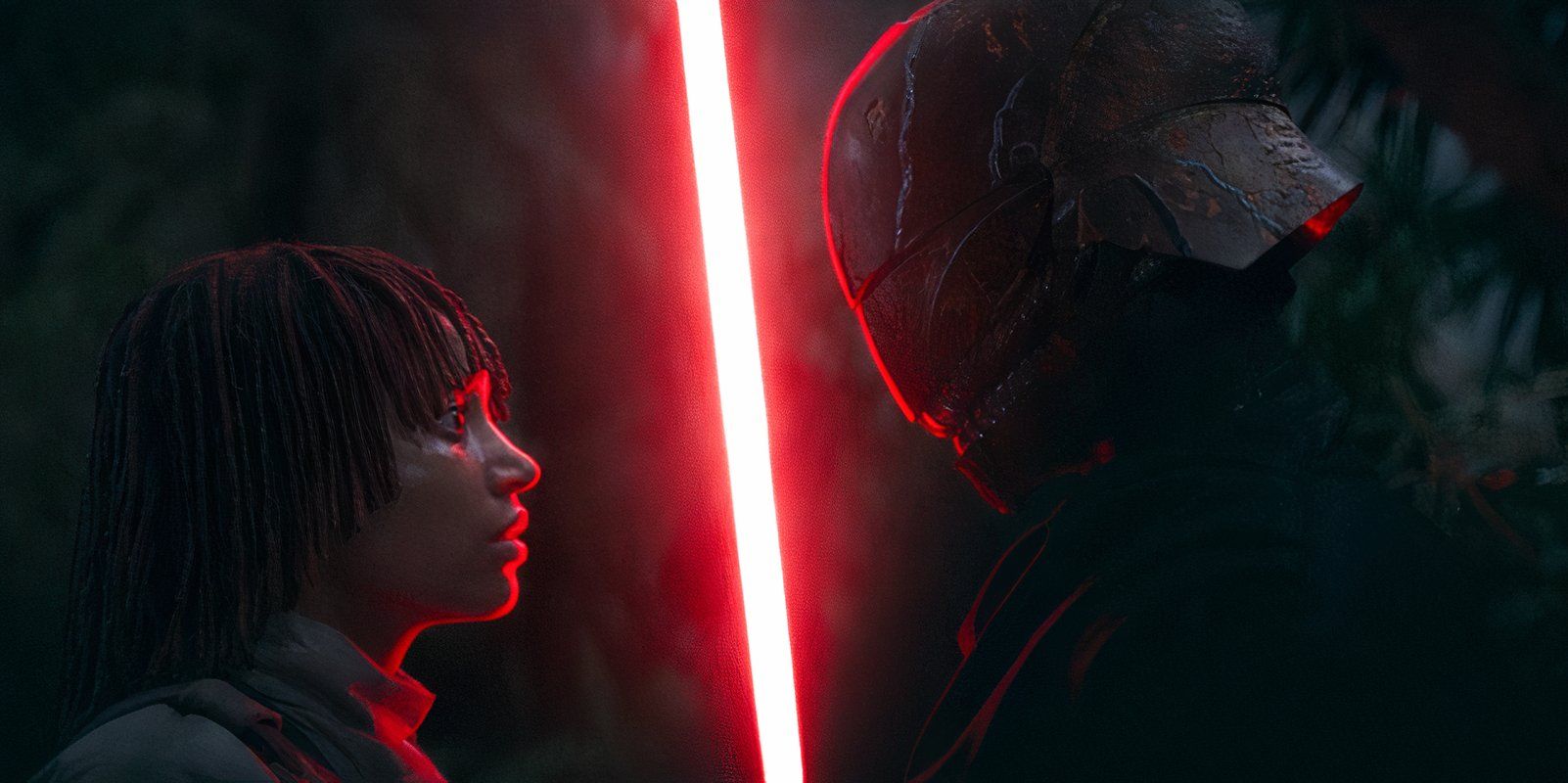 Osha Aniseya (Amandla Stenberg) looks terrified as the Sith Lord holds up their red lightsaber in front of her face in the Acolyte episode 4
