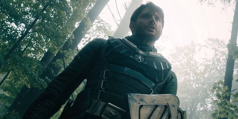 Soldier Boy wearing his green suit while in the forest in Gen V