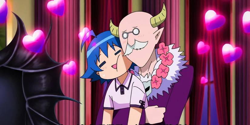 Willkommen auf der Dämonen-Schule! Iruma-Kun Lord Sullivan Umarmt Iruma, umgeben von schwebenden Herzen