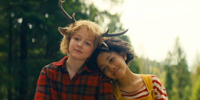 12 Post-Apocalyptic TV Shows, Ranked By How Much You’d Want To Live In What’s Left Of The World 5 Wendy (Naledi Murray) resting her head on Gus (Christian Convery)'s shoulder in Sweet Tooth season 3