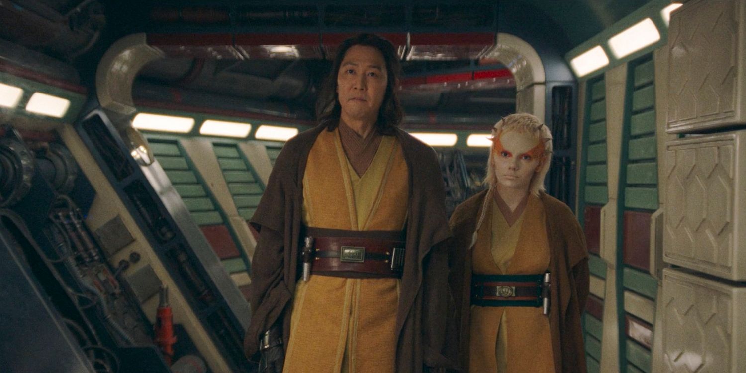 Master Sol (Lee Jung-jae) and Jecki Lon (Dafne Keen) standing side by side in The Acolyte Season 1, episode 1