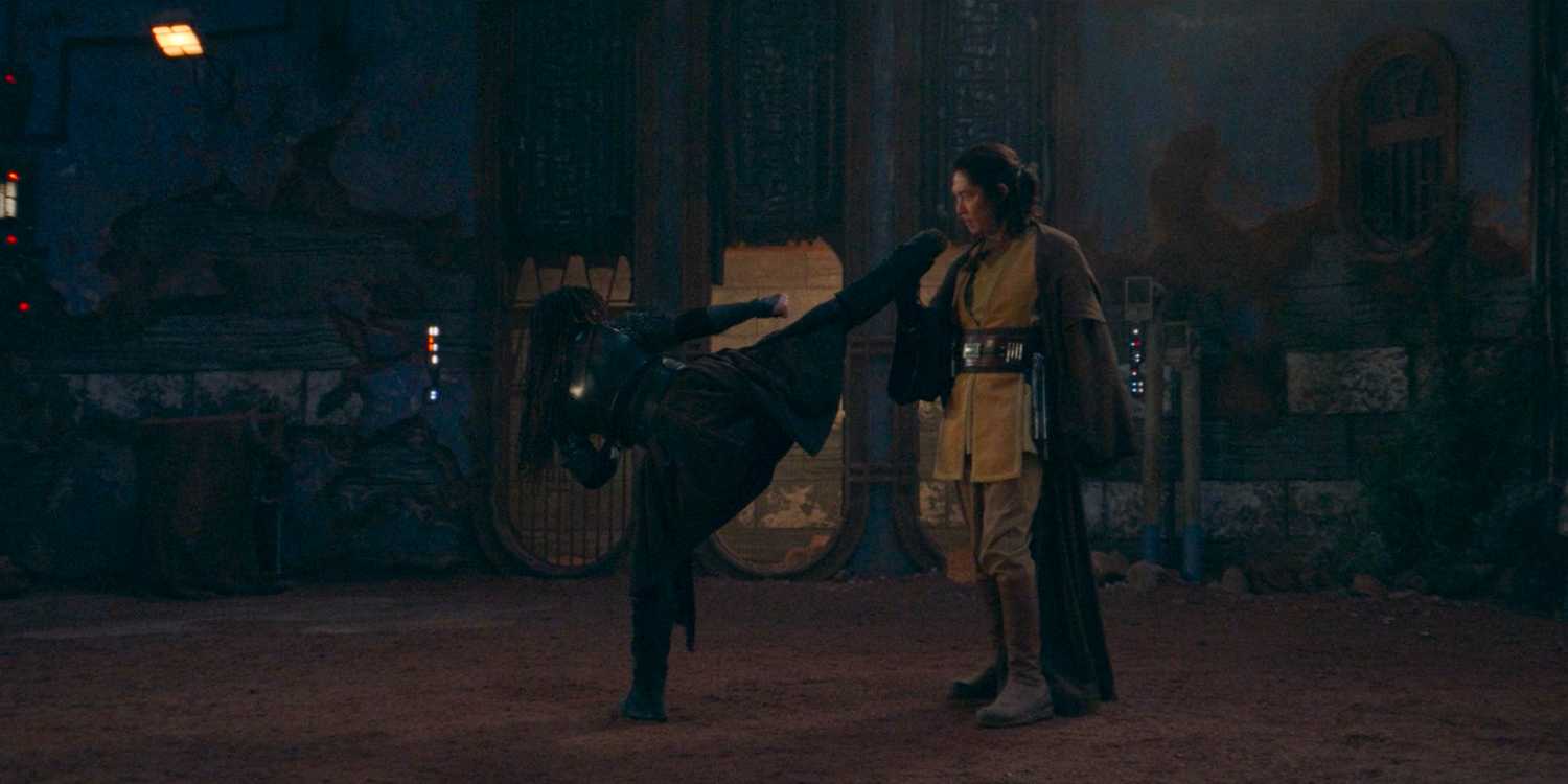Master Sol (Lee Jung-jae) skillfully stopping a kick from Mae in The Acolyte Season 1 episode 2