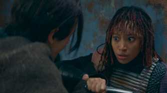 Qimir threatening Mae (Amandla Stenberg) with a dagger in The Acolyte Season 1 episode 2