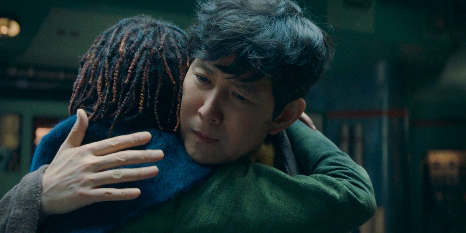 Master Sol (Lee Jung-jae) hugging a Little Osha (Lauren Brady) in The Acolyte season 1 episode 3