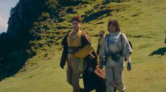 Yord Fandar (Charlie Barnett) and Osha (Amandla Stenberg) talking as they walk through the hills of Khofar in The Acolyte season 1 episode 4