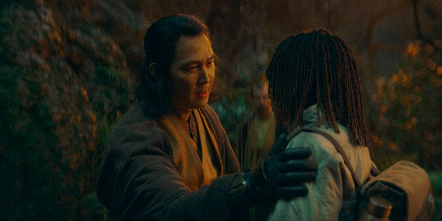 Master Sol (Lee Jung-jae) places his hand on Osha's (Amandla Stenberg) shoulder in a show of support in The Acolyte season 1 episode 4