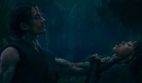 Qimir/Sith (Manny Jacinto) strangling Mae (Amandla Stenberg) for betraying him in The Acolyte season 1 episode 5