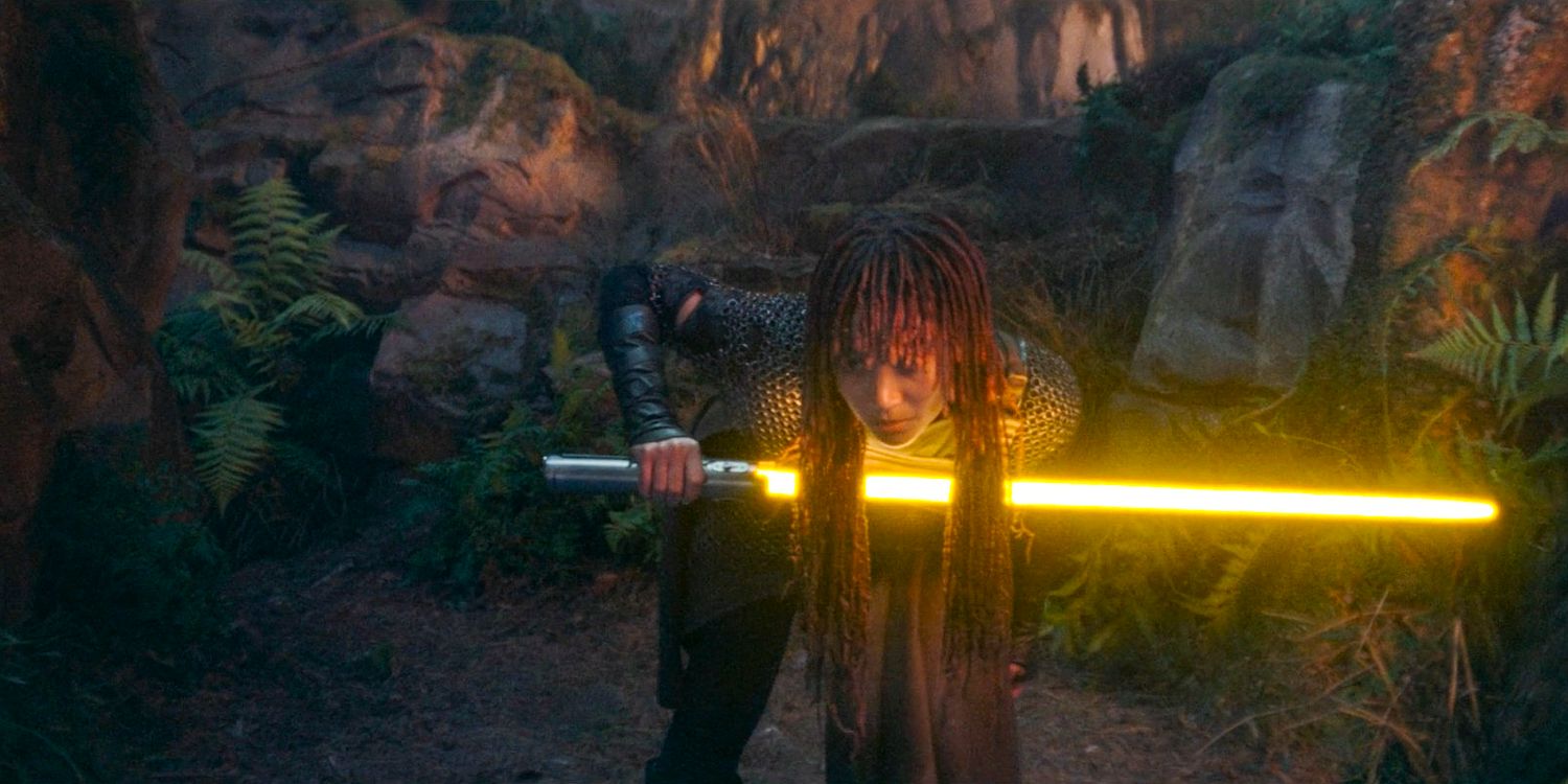 Mae (Amandla Stenberg) cutting her hair with a lightsaber in The Acolyte season 1 episode 5