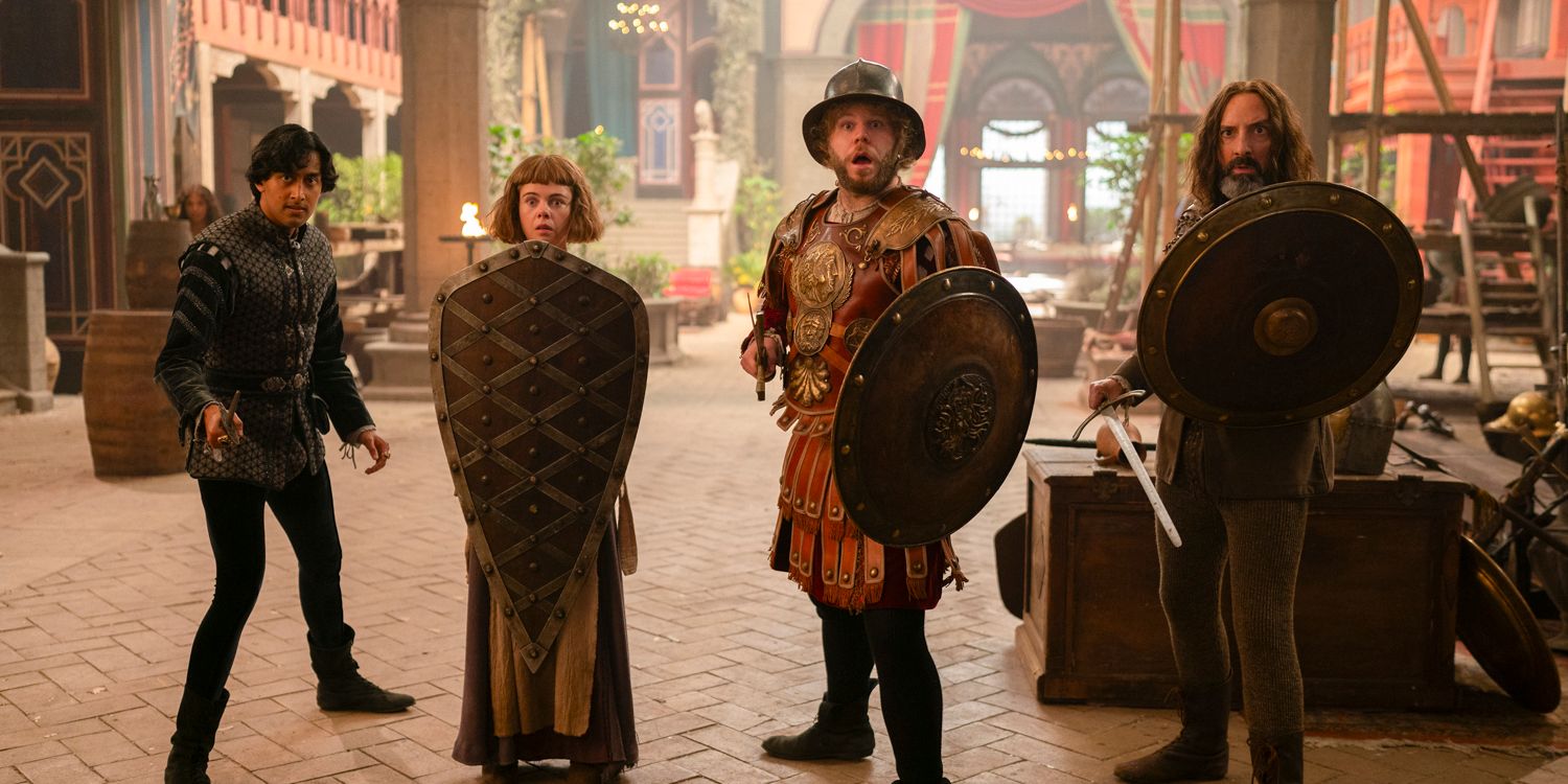 Panfilo (Karan Gill), Misia (Saoirse-Monica Jackson), Tindaro (Douggie McMeekin), and Sirisco (Tony Hale) carrying shields and swords in The Decameron season 1