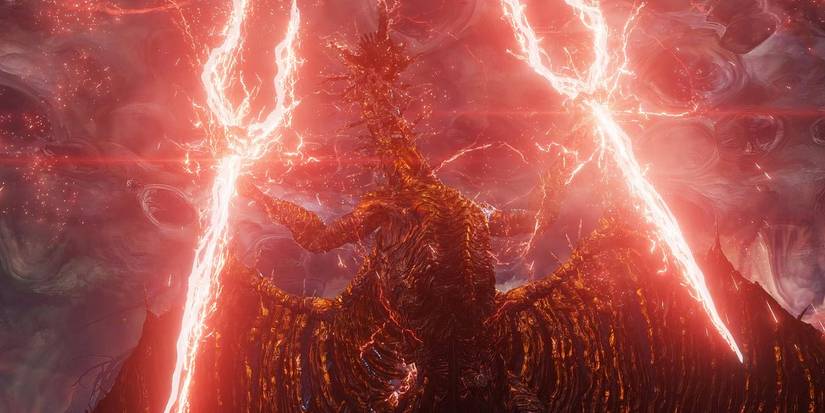 Личдракон Фортиссакс, держащий два красных триумфа в Elden Ring