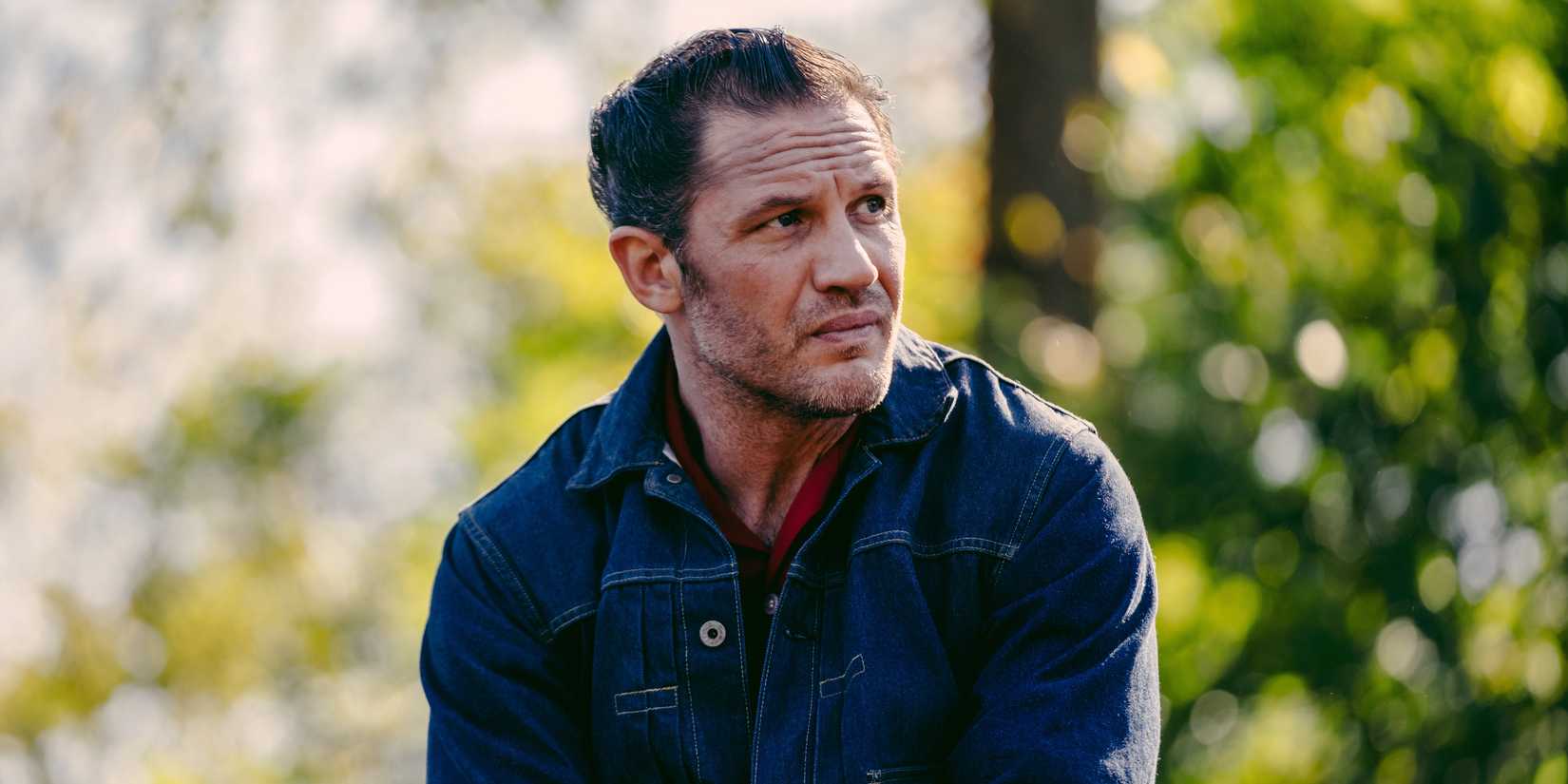Tom Hardy as Johnny looking pensive in The Bikeriders
