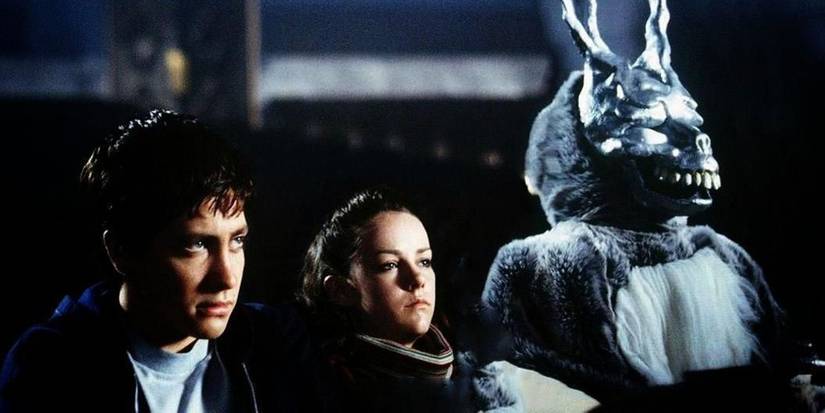 Donnie Darko, Gretchen e Frank em uma sala de cinema