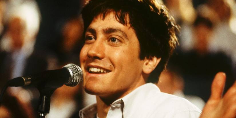 Jake Gyllenhaal as Donnie speaking into a microphone in Donnie Darko.