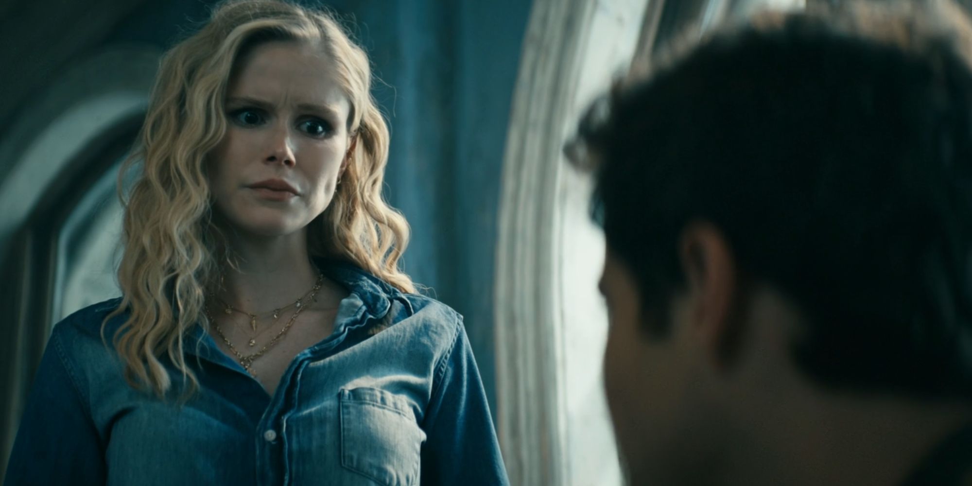 Erin Moriarty as Annie January looking concerned about Hughie in The Boys