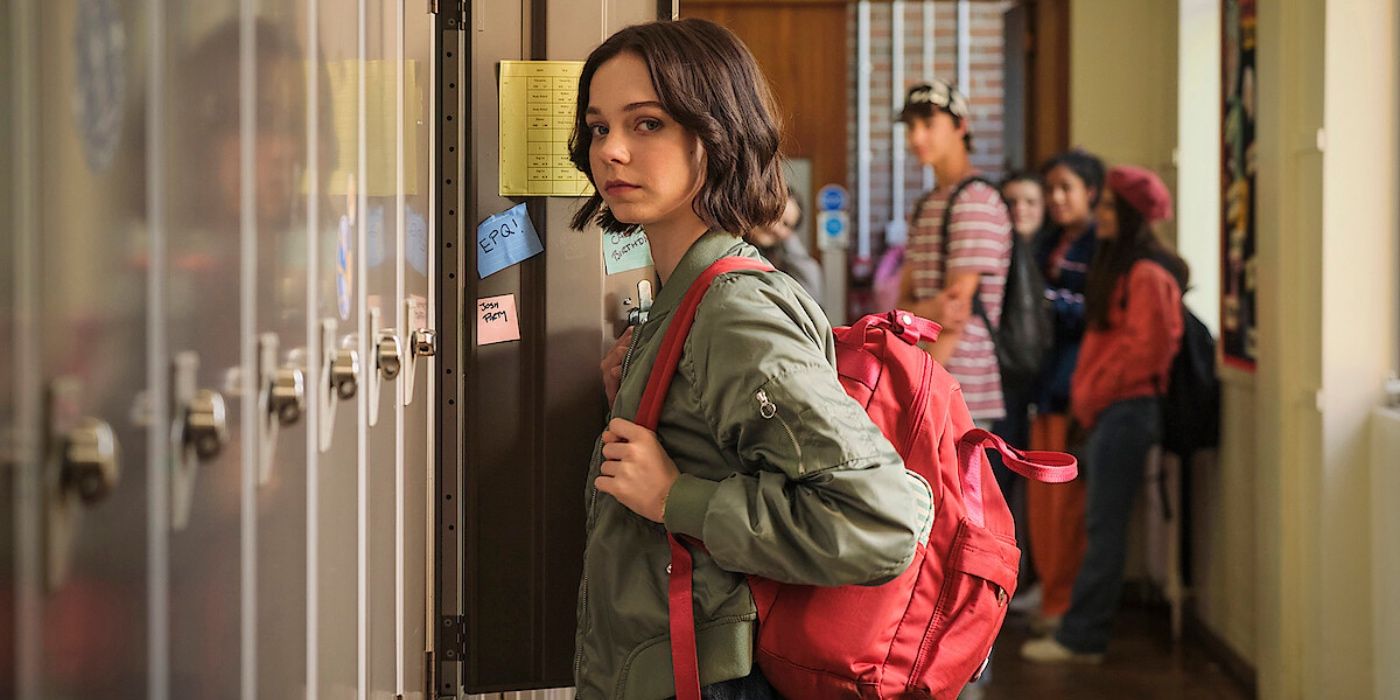 Emma Myers as Pip standing in front of her locker in A Good Girl's Guide To Murder