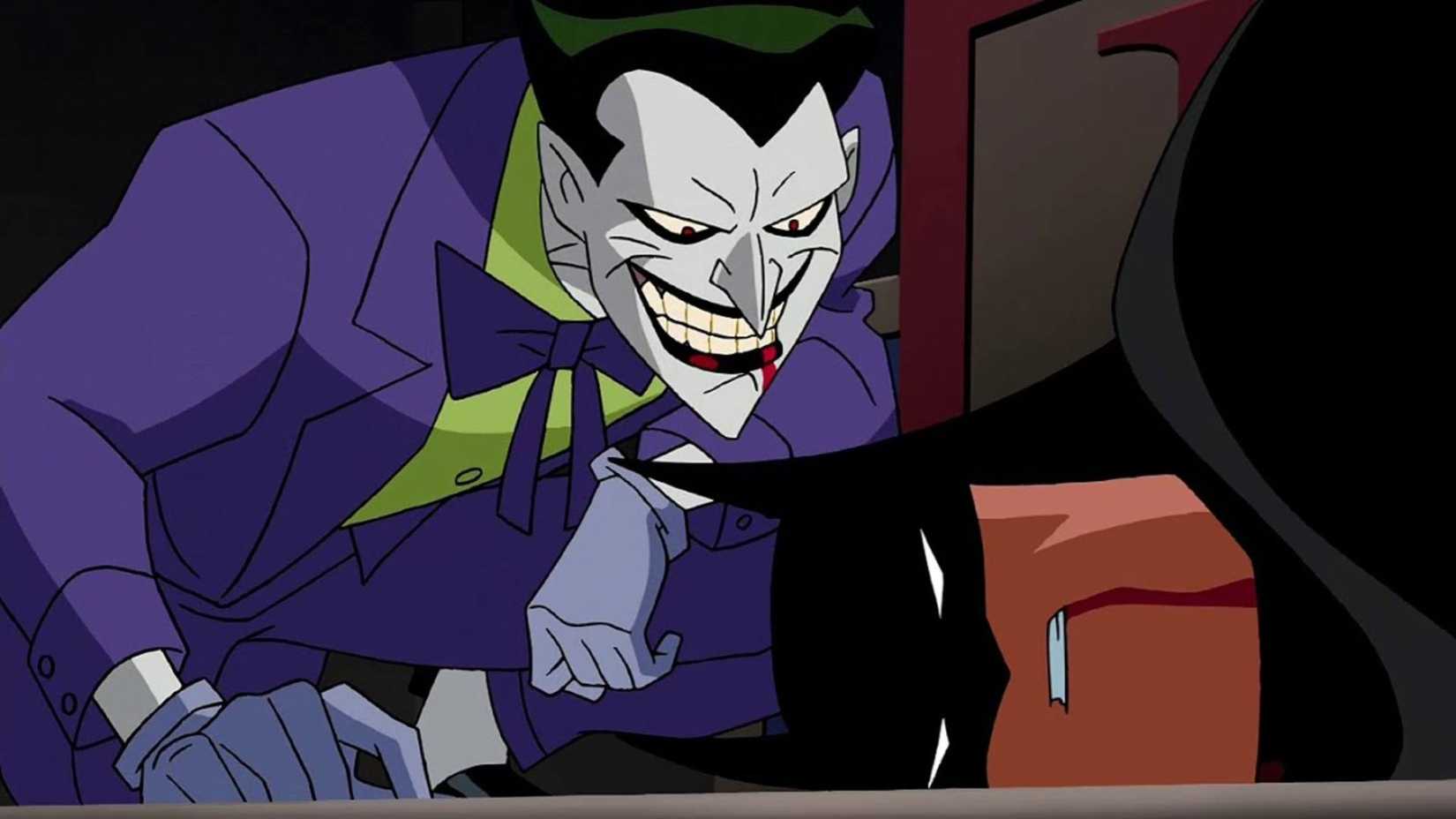 Joker stands over a bleeding Batman in Batman Beyond_ Return of the Joker
