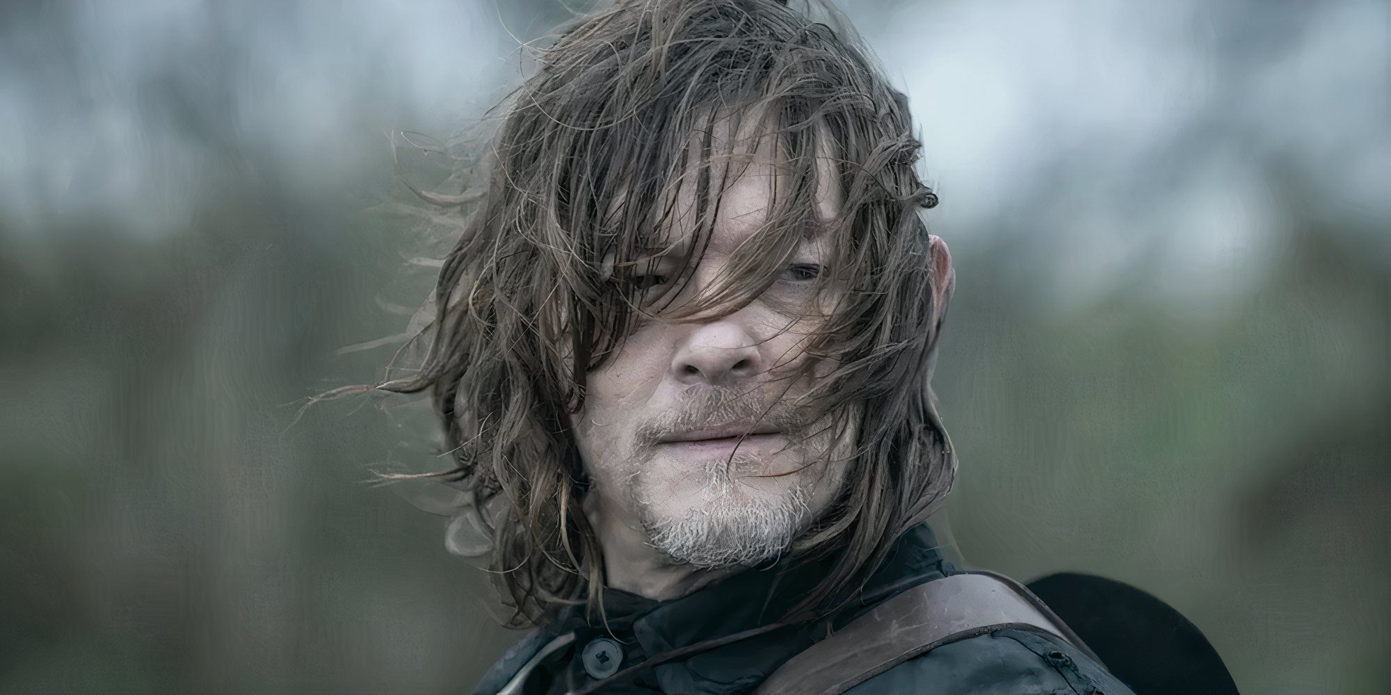 Norman Reedus as Daryl Dixon in his Walking Dead spinoff, with his hair flying in the wind.