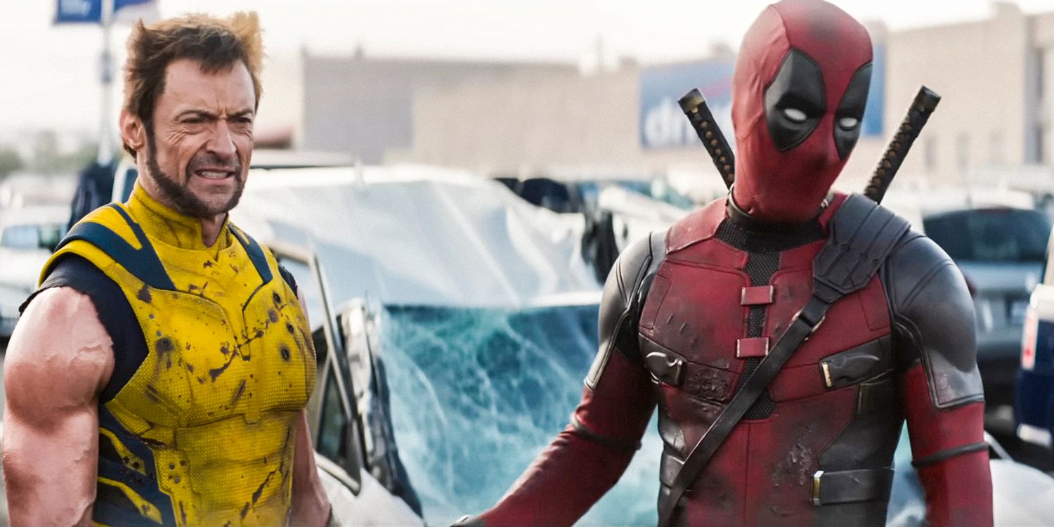 Wolverine (Hugh Jackman) and Deadpool (Ryan Reynolds) looking embarrassed after destroying a car by falling onto it in Deadpool & Wolverine