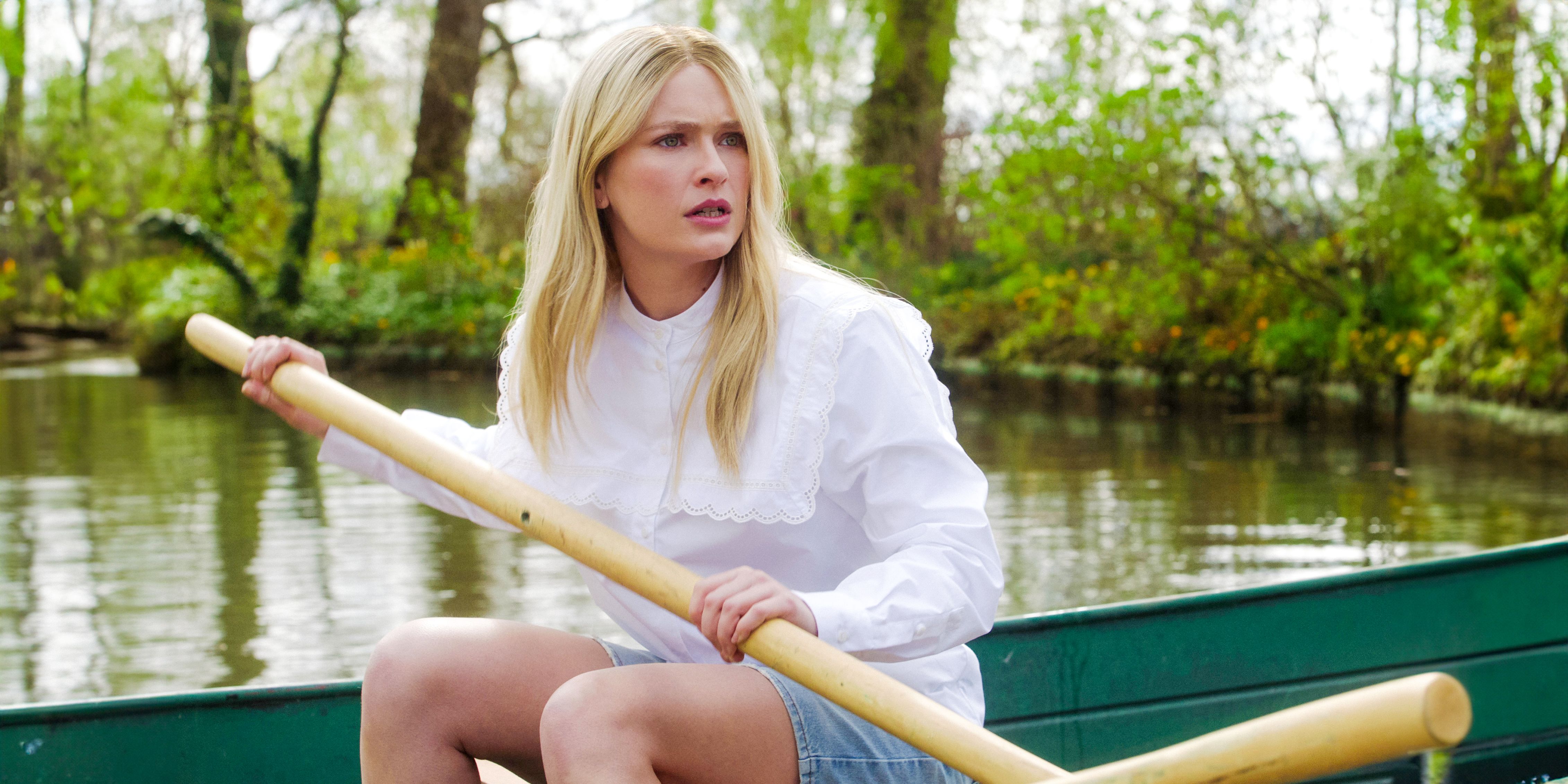 Camille (Camille Razat) rowing on a lake in Emily in Paris season 4