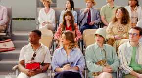 Emily (Lily Collins) among the audience at a tennis match in Emily in Paris season 4