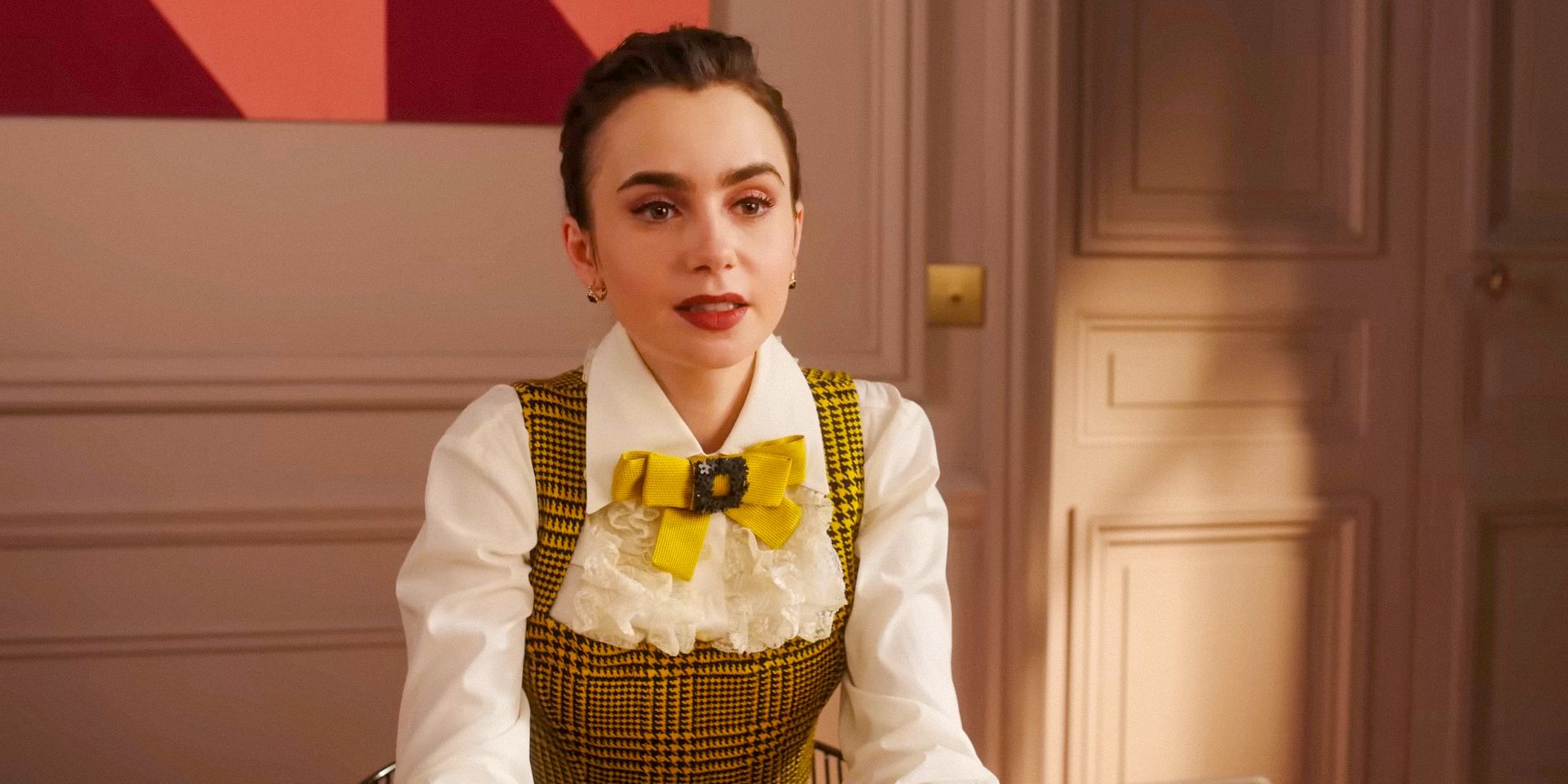 Emily (Lily Collins) looking worried at work in Emily in Paris season 4