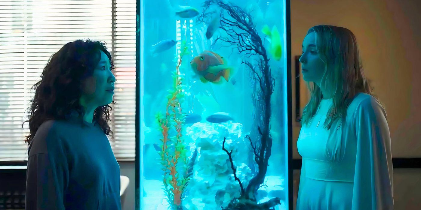 Eve (Sandra Oh) and Villanelle (Jodie Comer) look at each other through a fish tank in Killing Eve season 4