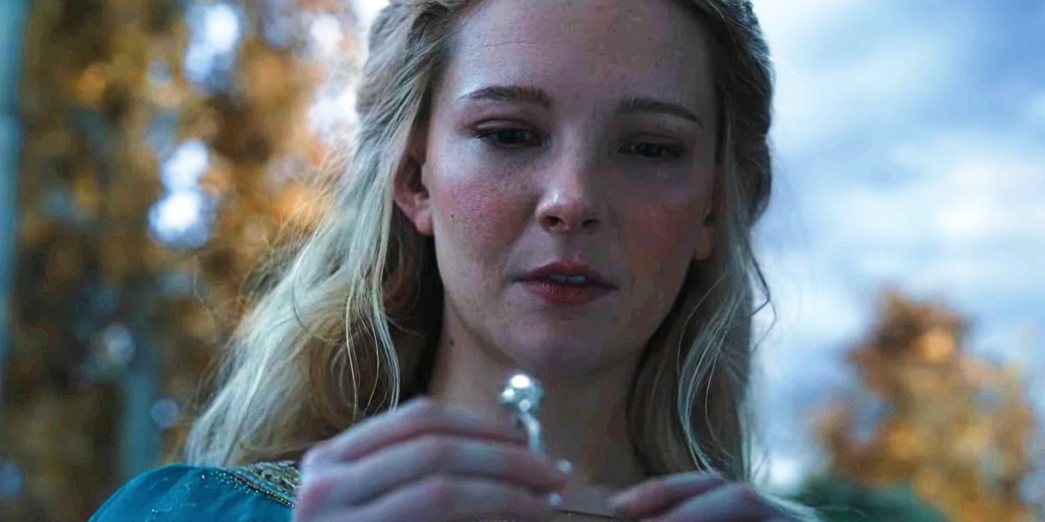 Galadriel stares longingly at her ring of power in Rings of Power season 2.