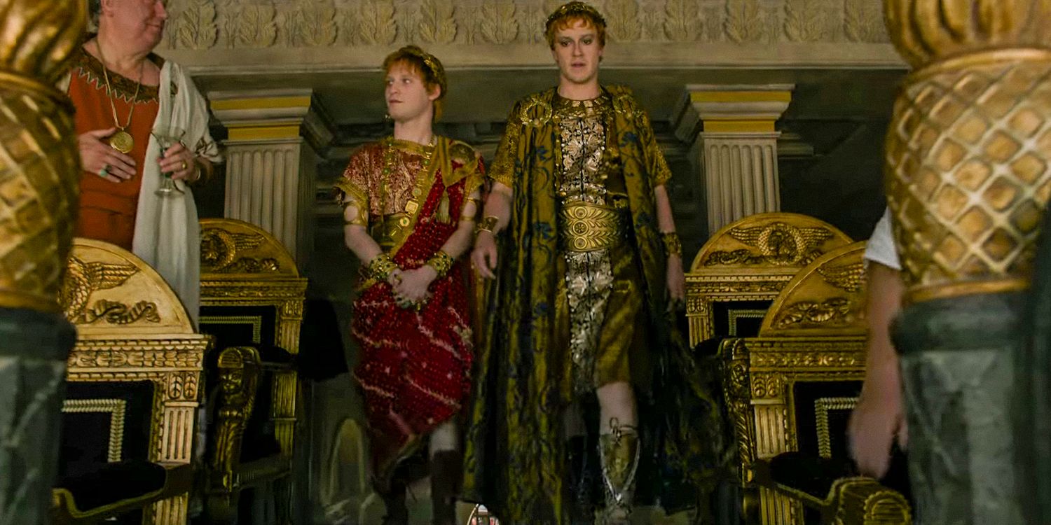 Fred Hechinger as Emperor Caracalla and Joseph Quinn as Emperor Geta walking into their box in Gladiator II