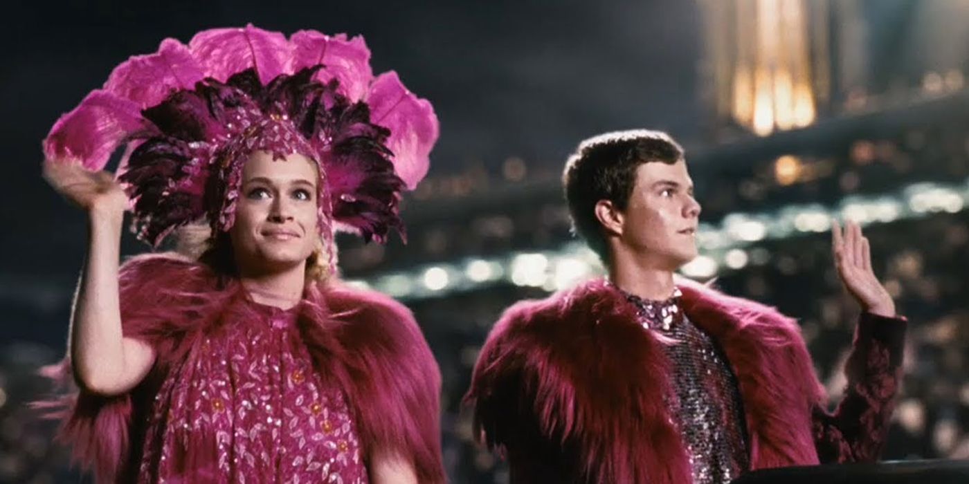 glimmer and marvel riding in a carriage in the tribute parade