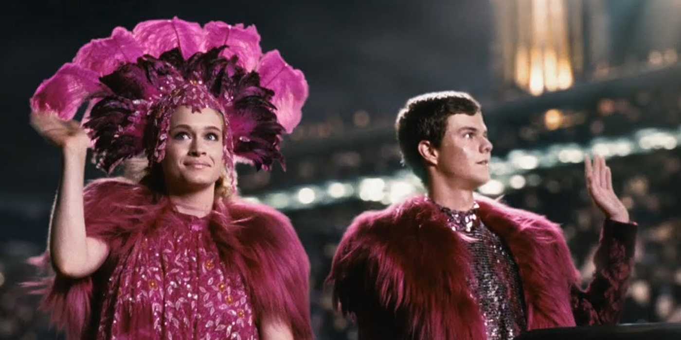 glimmer and marvel riding in a carriage in the tribute parade