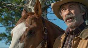Jack looks shocked while standing next to a horse in Heartland