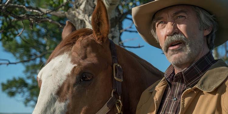Jack looks shocked while standing next to a horse in Heartland