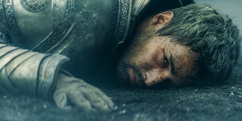 Ser Criston Cole (Fabien Frankel) lying on the ground covered in ashes in House of the Dragon season 2 episode 4