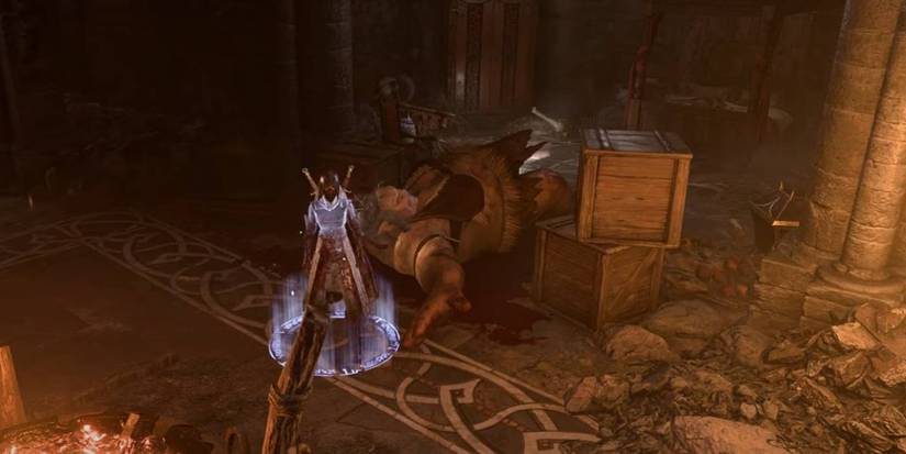 Baldur's Gate 3 Rogue/Ranger standing over enemy corpse after dealing huge damage with Assassin sneak attack