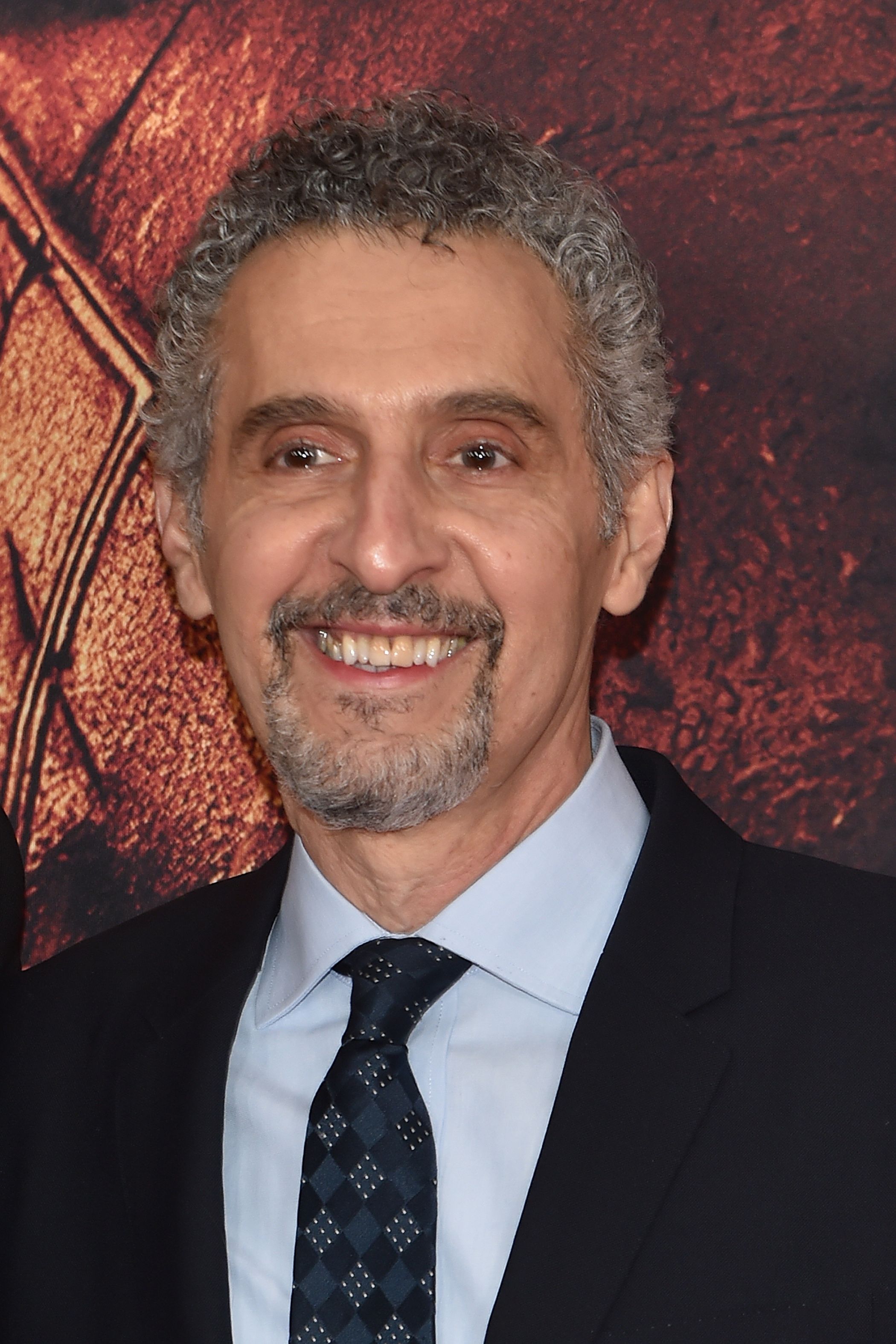 Headshot Of John Turturro In The Arrivals for 'The Batman' World Premiere