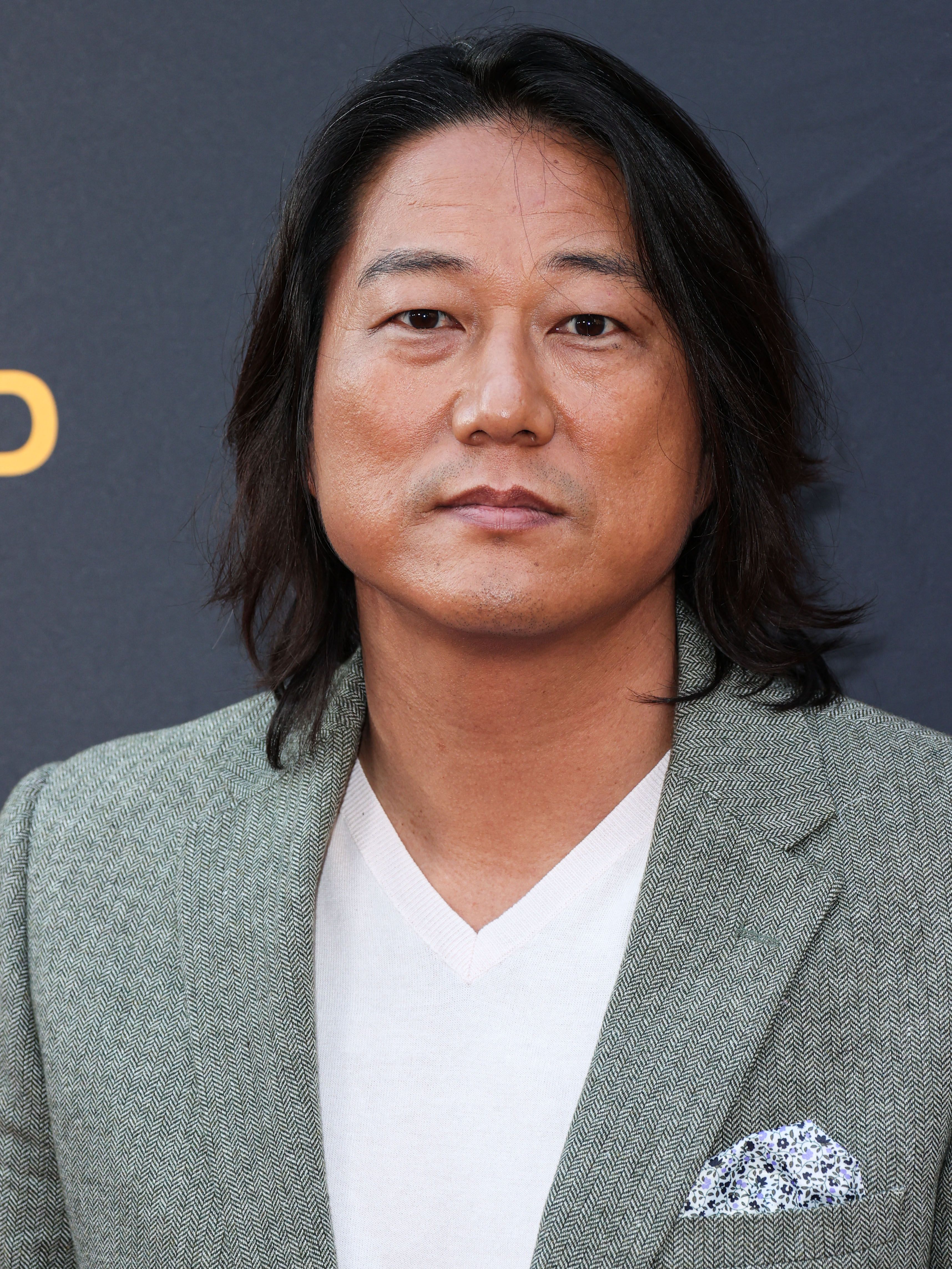 Headshot Of Sung Kang In The Charlize Theron Africa Outreach Project (CTAOP) 2023 Block Party 