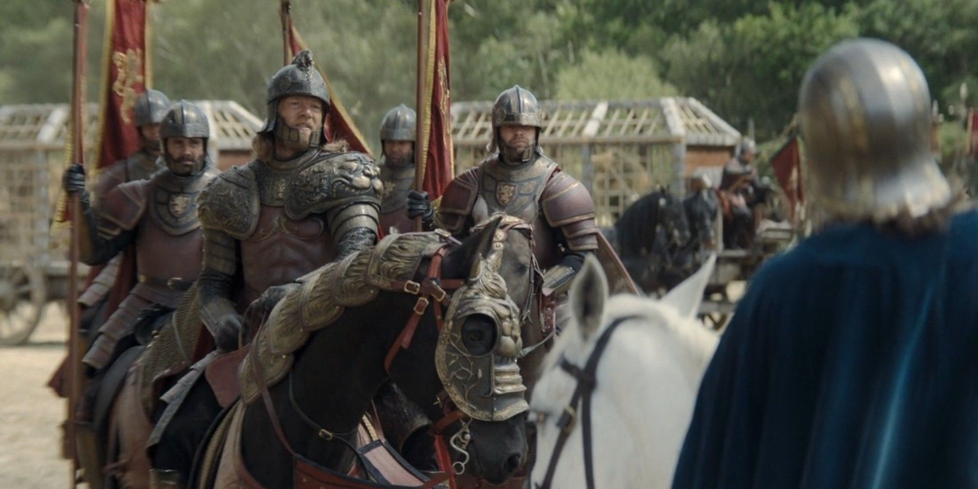 Jason Lannister and other Lannister knights on horses with caged lions behind them in the background