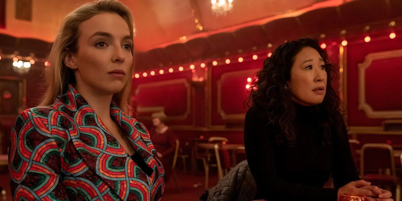 Jodie Comer as Villanelle looking serious and Sandra Oh as Eve looking concerned in a dance club in Killing Eve season 3
