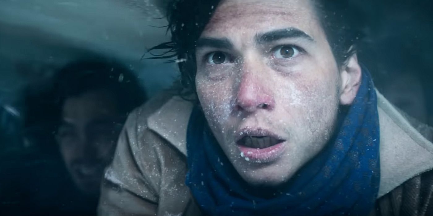 Jose looking frozen and terrified in Society of the Snow