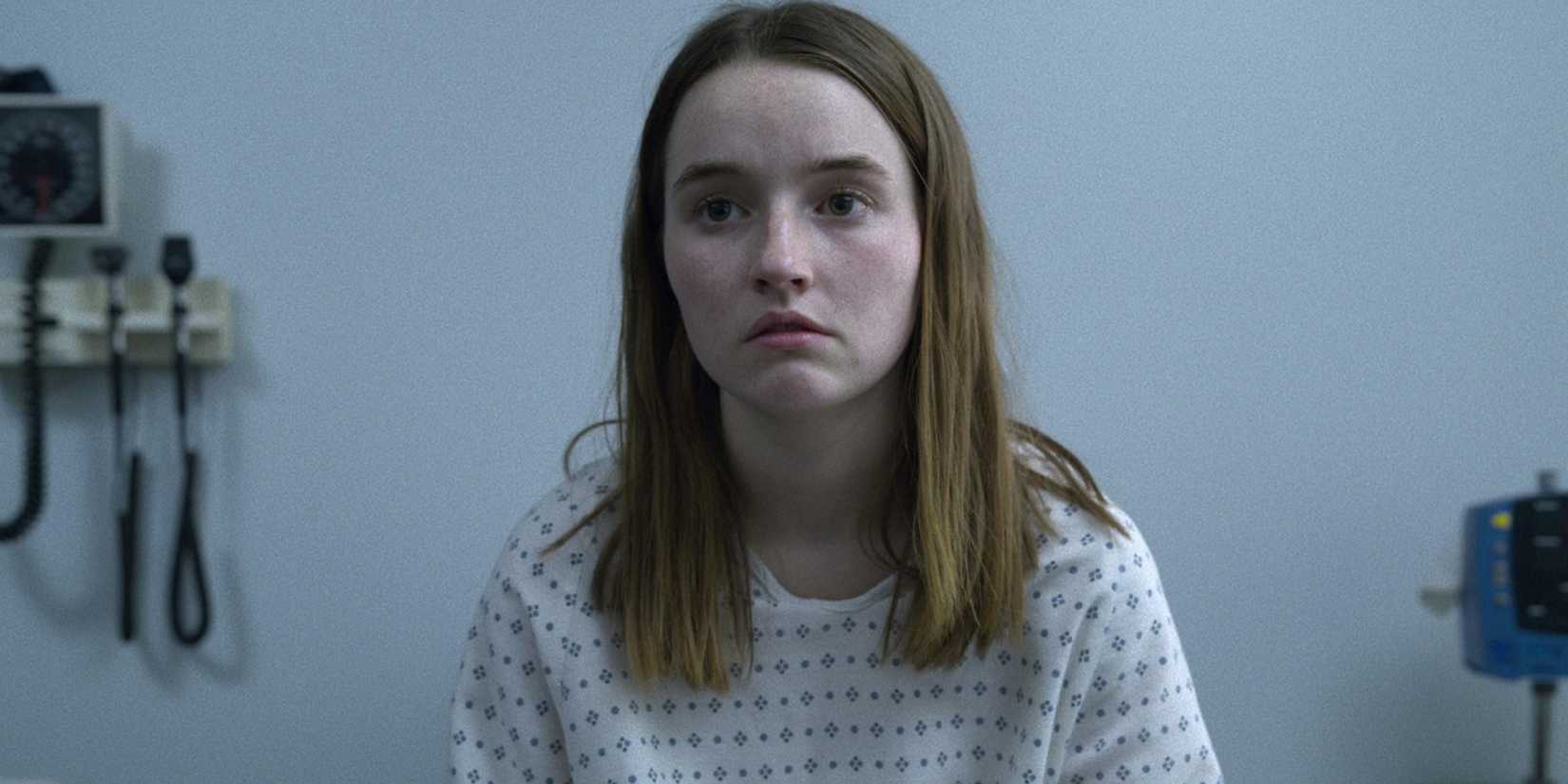 Kaitlyn Dever as Marie in a hospital gown in Unbelievable